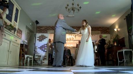 a bride enjoys a dance with her dad on a traditional black and white dancefloor at Abel's Harp