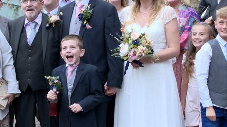 carter the page boy pulls a silly face for their wedding photographer Thomas Ellwood