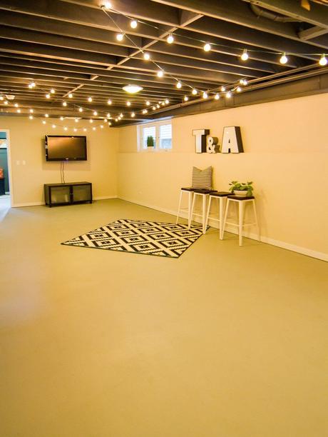 exposed basement ceiling ideas - 21. Add String Lights to Basement Ceiling - Harptimes.com