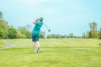 golfer taking a swing