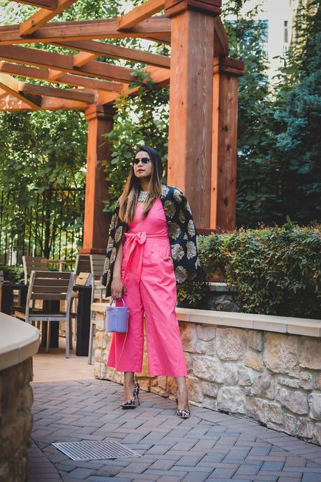 jumpsuit with jacquard blazer, indian brocade blazer, fusion outfit, salmon colored jumpsuit, fashion, street style, floral heels, black silk blazer, bow front jumpsuit, purple barrel bucket bag, myriad musings