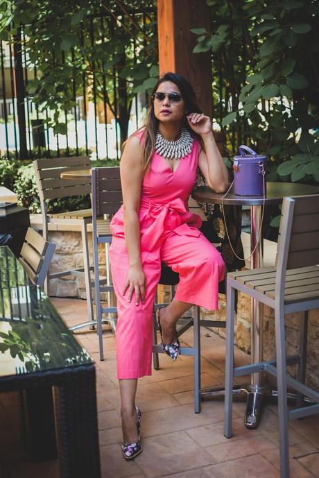 jumpsuit with jacquard blazer, indian brocade blazer, fusion outfit, salmon colored jumpsuit, fashion, street style, floral heels, black silk blazer, bow front jumpsuit, purple barrel bucket bag, myriad musings
