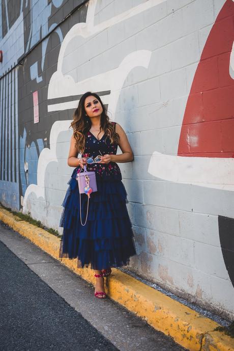 j crew embroidered peplum top, tule skirt asos, navy blue monochromatic outfit, street style, party look, studded sandals, bright pink lips, bucket bag, purple bag, myriad musings 