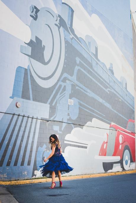 j crew embroidered peplum top, tule skirt asos, navy blue monochromatic outfit, street style, party look, studded sandals, bright pink lips, bucket bag, purple bag, myriad musings 