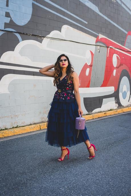 j crew embroidered peplum top, tule skirt asos, navy blue monochromatic outfit, street style, party look, studded sandals, bright pink lips, bucket bag, purple bag, myriad musings 