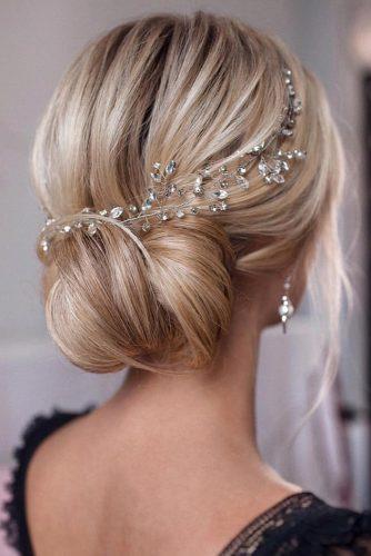 wedding hairstyles for long hair simple bun with accessorise