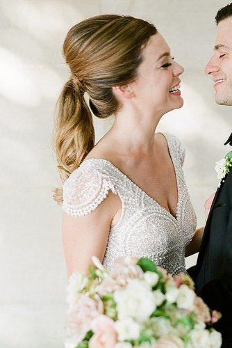 wedding hairstyles for long hair wavy ponytail with bun
