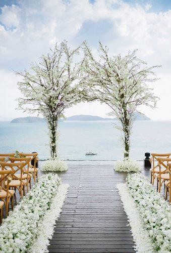 destination weddings decorations tree near lake Darin Images