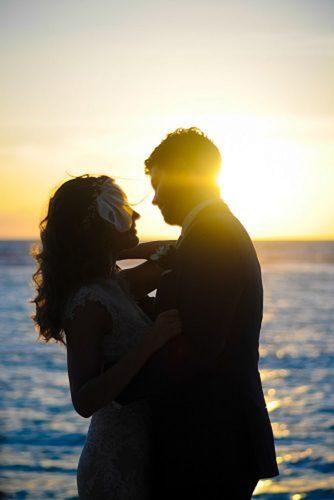 wedding photo shoot essentials couple near sea Sunset