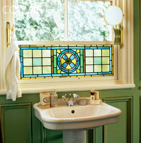 half window stained glass treatment natural light traditional vanity
