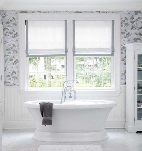 gray trimmed white shades in bathroom stand alone tub