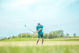 golfer hitting ball