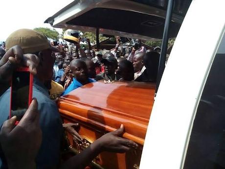 Sharon Otieno's casket being loaded into the hearse 