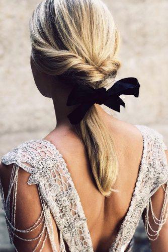 wedding hairstyles 2019 swept ponytail on medium hair with black bow luxit_official