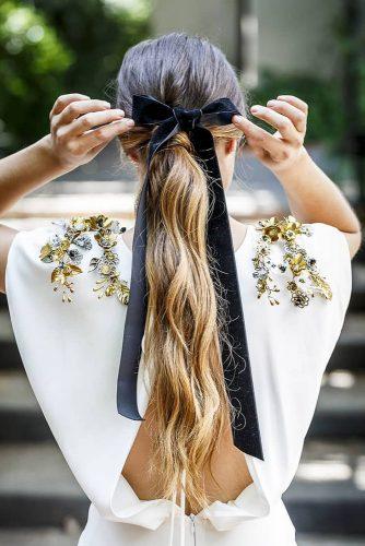 wedding hairstyles 2019 long bridal ponytail with black ribbon bow esif_fotografia