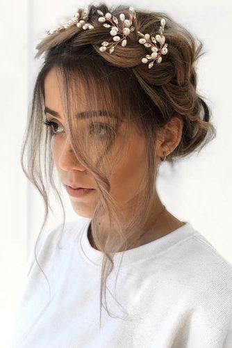 wedding hairstyles 2019 updo with braided crown loose curls and accessorie ulyanaasterbridal