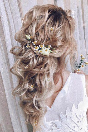 wedding hairstyles 2019 curly half up half down on blonde hair with flowers in bohemian style my_wedmakeup
