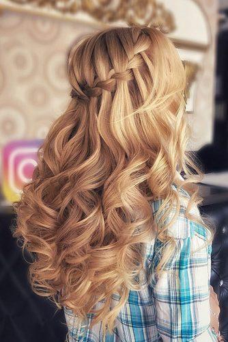wedding hairstyles 2019 braided waterfall on long curly blonde hair naida_style