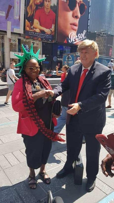 Fayose’s Mom Pictured With Donald Trump’s Lookalike In US As She Celebrates Birthday