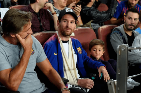 Injured Lionel Messi Wears A Sling As He Watches Barcelona Match With His Son (Photos)