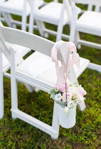 wedding chair decorations flower in white jars leilabrewsterphotography