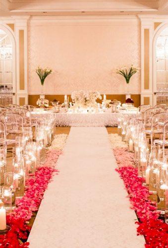 coral wedding decorations coral aisle with candles Lisa Boggs Photography
