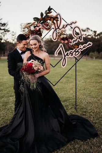 wedding trends 2019 dark dress modern geometry bridal backdrop with autumn flowers and bright signs wolfandwildflowerphotography