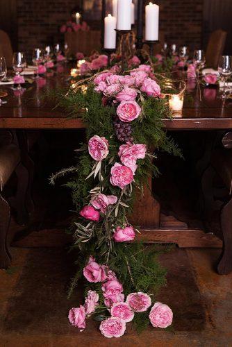 wedding trends 2019 low flower pink roses and dark greenery tablerunner djamelphotography