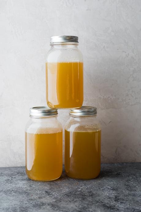 three jars with turkey bone broth