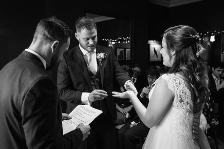 exchanging rings at a norwich wedding