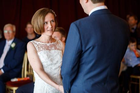 susie looks at steve during the wedding vows