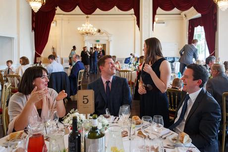 guests talk at the wedding breakfast