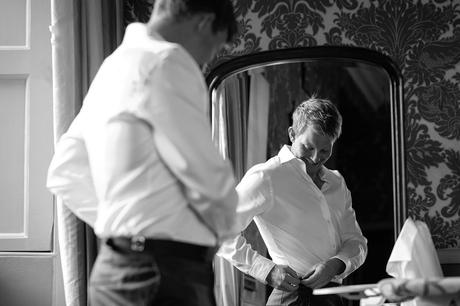 Hengrave Hall Wedding Photography | Alice and Nick the groom prepares