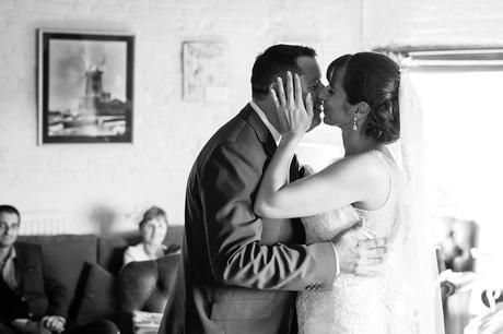 first kiss at a cley mill wedding