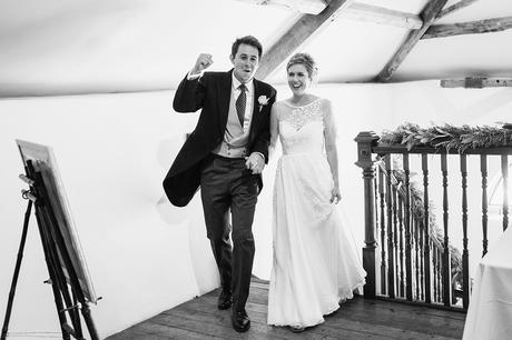 bride and groom enter the coach house at pennard