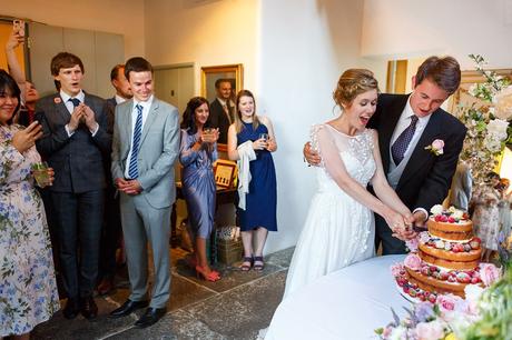 cutting the cake in the coach house