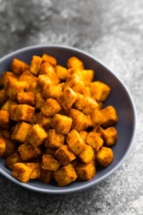 baked tofu in blue bowl