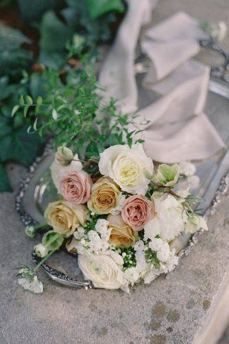 besame wedding styled shoot peach pink white roses flower bouquet with ribbons carrie king photographer
