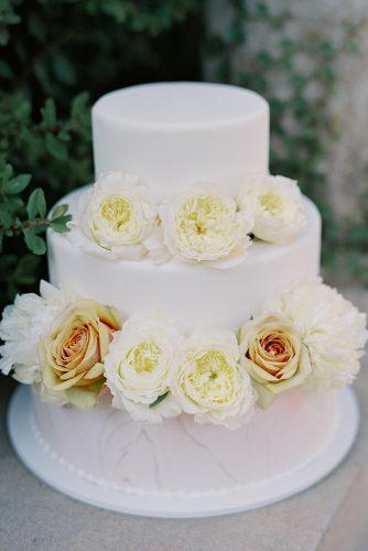 besame wedding styled shoot simple three tired white marble cake with peach roses carrie king photographer