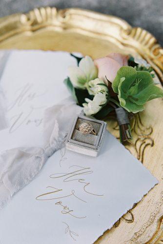 besame wedding styled shoot bride and groom's rose boutonniere gold round ring with stones carrie king photographer