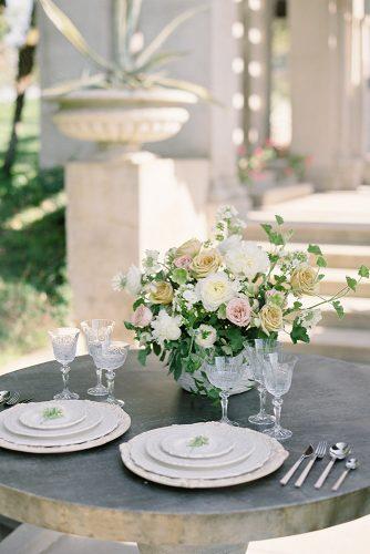 besame wedding styled shoot round small outdoor table with beige plates carrie and flower roses centerpiece king photographer