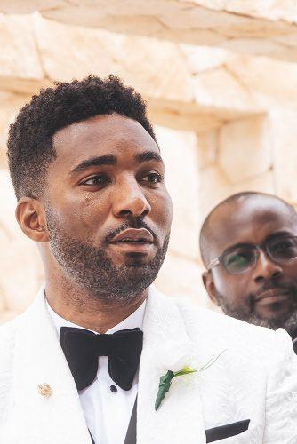 real wedding cindy glen ceremony photography the groom watches the bride walk down the aisle stanlo photography
