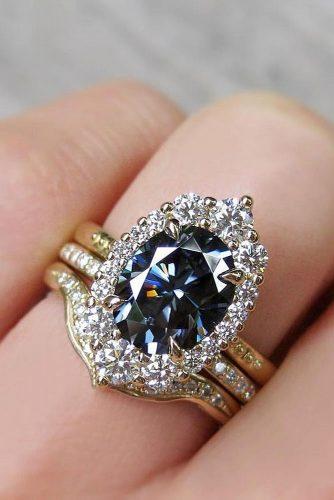 engagement ring trends 2018 oval cut colored gray diamond halo set