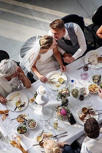 wedding dinner music celebration guests newlyweds