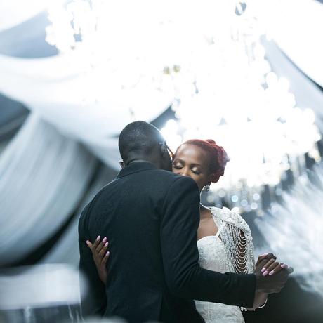 Photos of Sauti Sol’s Polycarp Otieno exchanging vows with his Burundian sweetheart in a white wedding