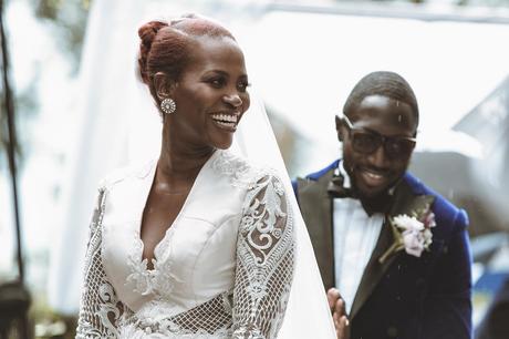 Photos of Sauti Sol’s Polycarp Otieno exchanging vows with his Burundian sweetheart in a white wedding