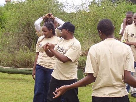 Simon Kabu (in a black cap) with Sarah during the team building event in Lukenya in 2007