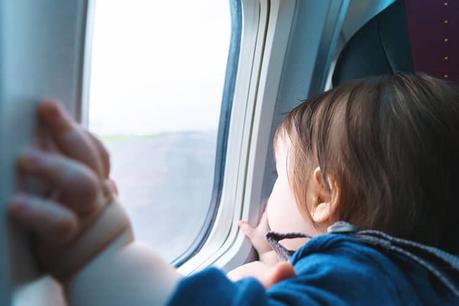 The Best Tips for Keeping Small Kids Happy an Airplane!