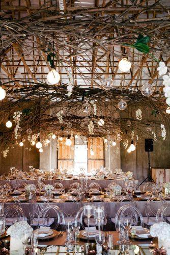 wedding decor 2019 industrial reception with hanging branches transparent chairs vanilla photography
