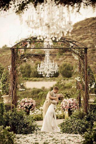 wedding decor 2019 shabby chic garden ceremony with pink roses and crystal chandelier victor sizemore photography